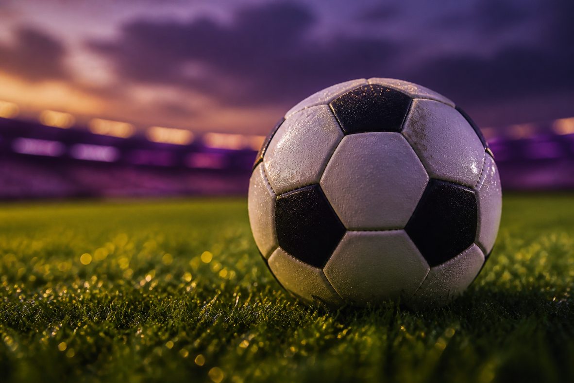 Soccer ball on wet Premier League grass
